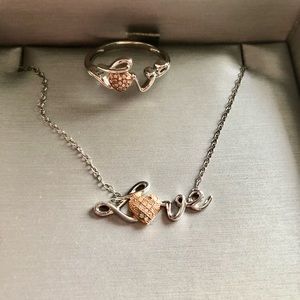 Zales solid sterling silver and rose gold .15ct diamond ring and necklace set.